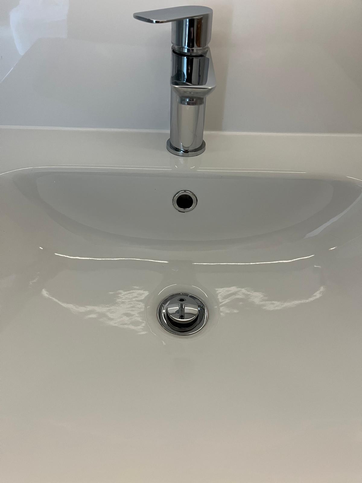 Chrome basin mixer sparkling after cleaning