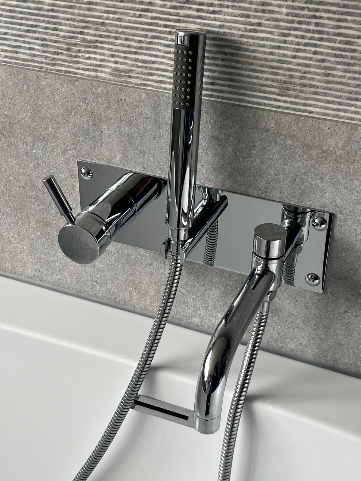 Chrome bath and shower mixer, polished after a changeover
